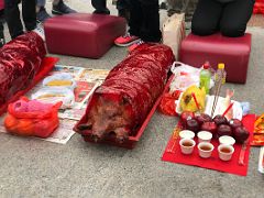 05B Offerings include suckling pigs, fruit, and buns at Wong Tai Sin temple Hong Kong